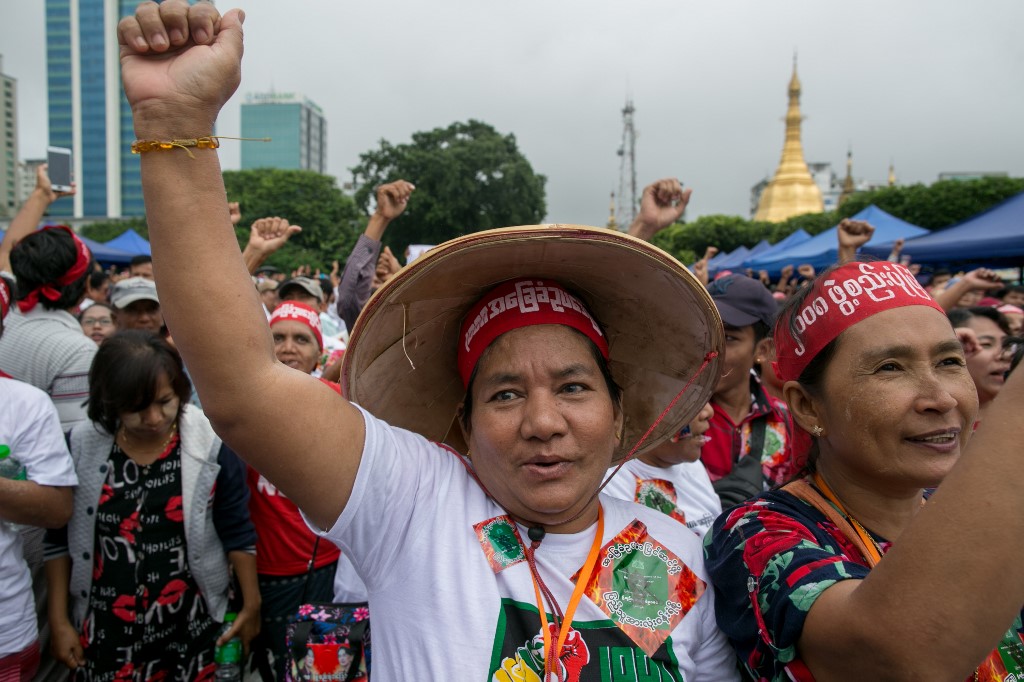People participate in a protest in support of amendments to the 2008 Myanmar constitution in Yangon on July 17, 2019. (Sai Aung Main / AFP)