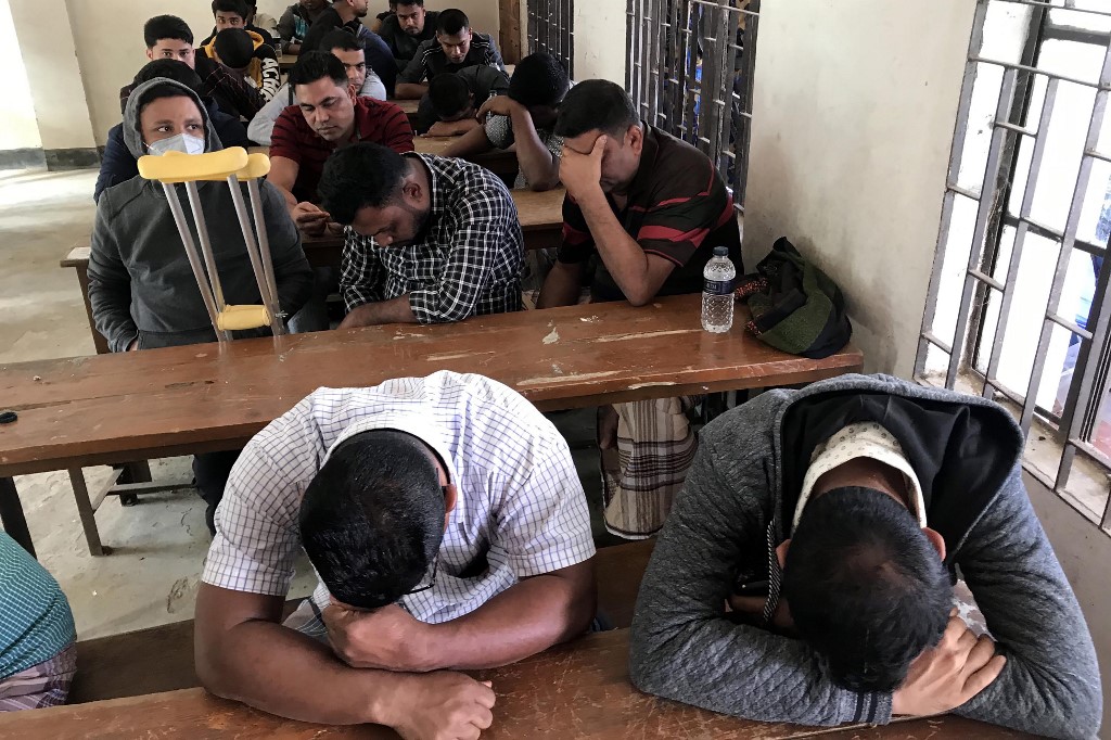 This photographs taken on January 3, 2020, shows Bangladeshi drug kingpins sitting in Teknaf. (STR / AFP)