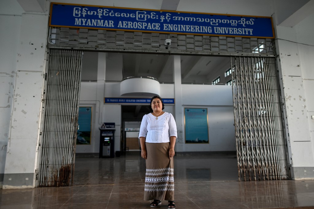 This photo taken on June 19, 2020 shows engineer Thu Thu Aung, 40, posing for a photo at the Myanmar Aerospace Engineering University in Meiktila. (Ye Aung Thu / AFP)