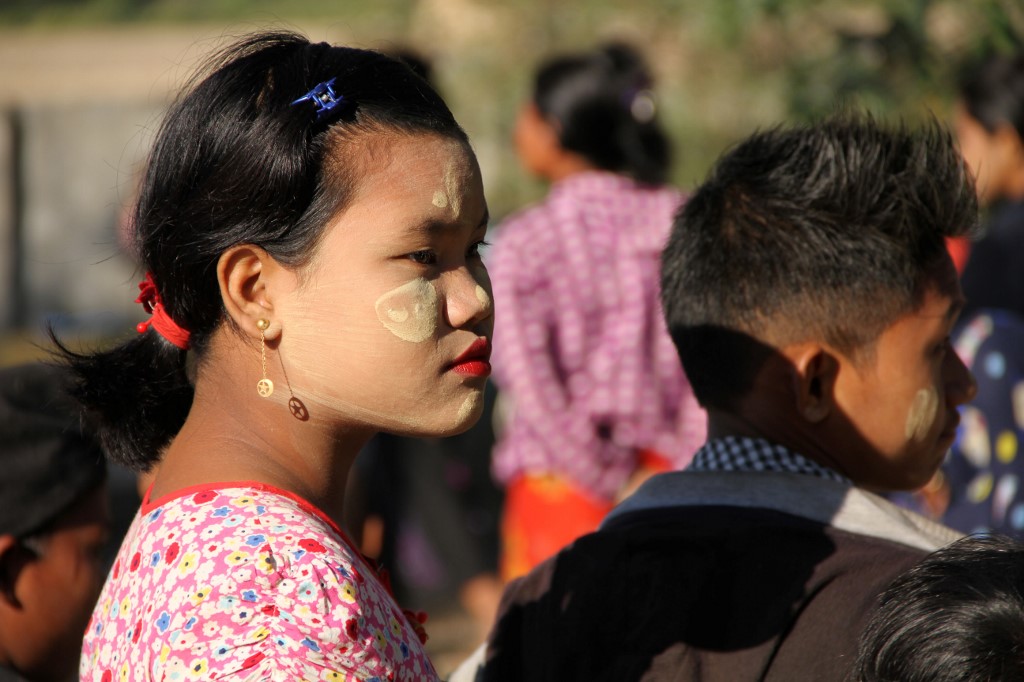 In this file photo taken on January 25, 2019, Mro ethnic women with children displaced from the surge of fighting between ethnic armed rebel group of the Arakan Army and government troops take refuge at a compound of a Buddhist pagoda. (Richard Sargent / AFP)