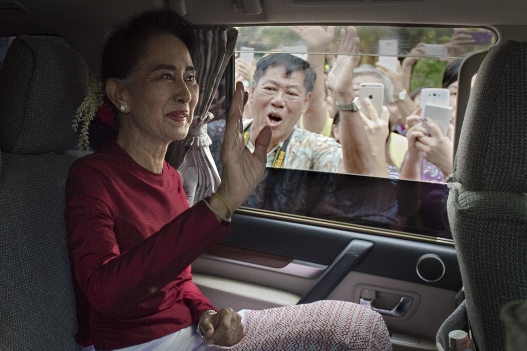 Myanmar opposition leader and head of the National League for Democracy (NLD) Aung San Suu Kyi leaves her house to cast her vote at a polling station in Yangon on November 8, 2015. (Nicolas Asfouri / AFP)