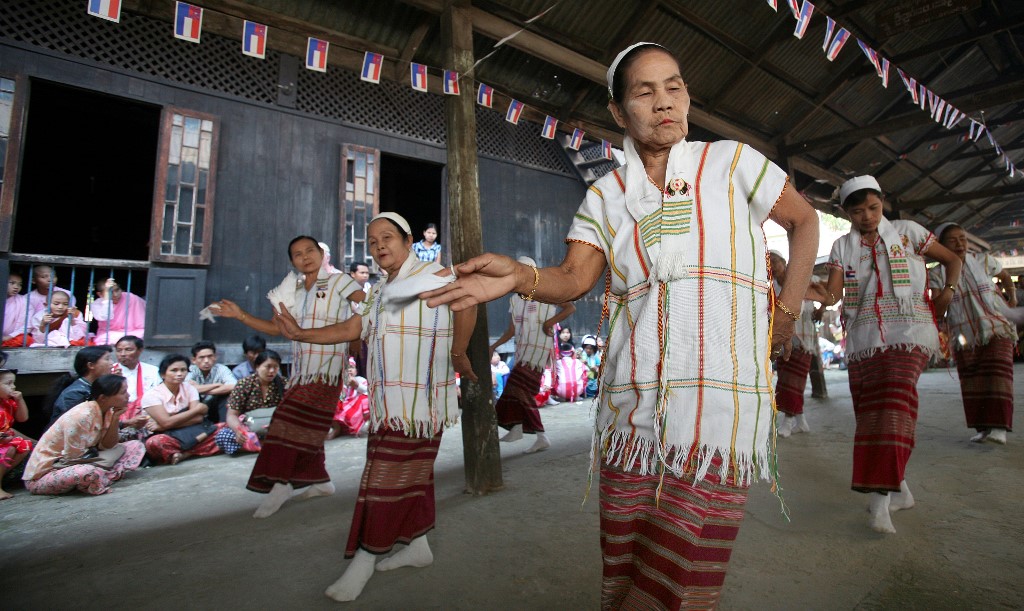 Karen women perform a traditional dance for New Year Celebrations in Yangon. (AFP / Khin Maung Win)