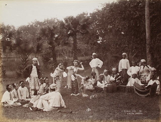 Burmese performers stage a play in a Rangoon park in 1907. (Philip Adolphe Klier / The National Archives UK)