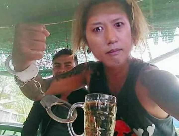 The face of rapper and actor Sai Sai Kham Leng superimposed over a man handcuffed to what may well be a mug of herbal tea.