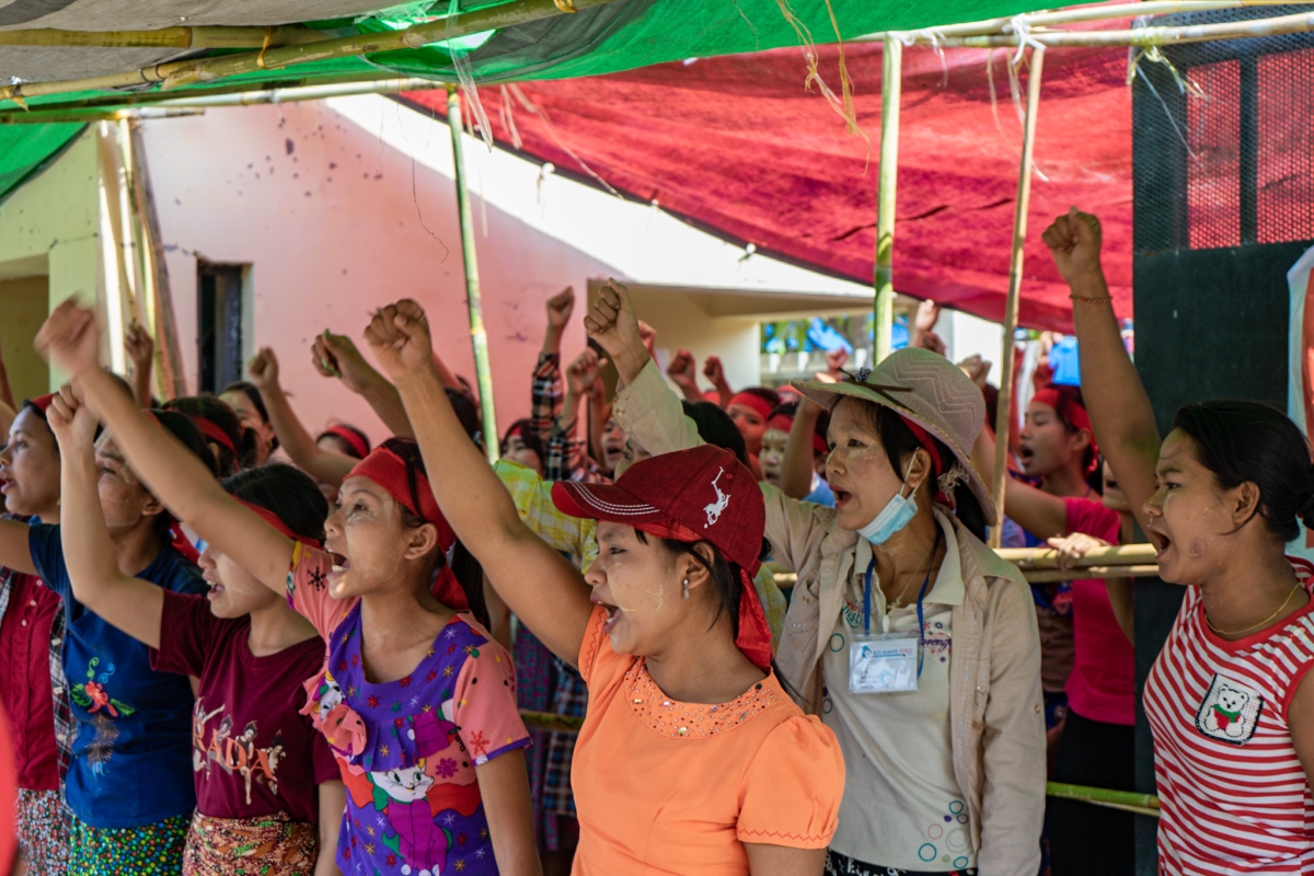 Garment workers in Dagon Seikkan protest outside a factory on April 7. (Faeez Safedien)