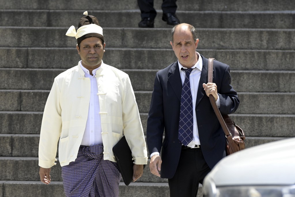 The President of The Burmese Rohingya Organisation UK (BROUK), Tun Khin (L) and Argentine human rights lawyer Tomas Ojea Quintana (R) leave Argentine federal court in Buenos Aires on November 13, 2019. (AFP)