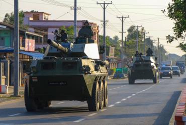 Soldiers ride in military armoured vehicles in Myitkyina, Kachin state on February 3, 2021, as Myanmar's ousted leader Aung San Suu Kyi was formally charged on Wednesday two days after she was detained in a military coup. (STR / AFP)