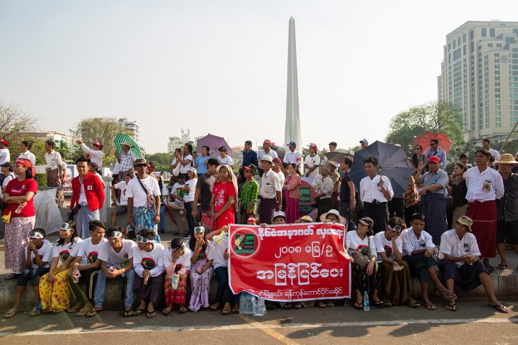 People participate in a rally calling for reforms on Myanmar's military-scripted constitution in Yangon on February 27, 2019. (Sai Aung Main / AFP)