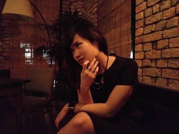 Claire Lim stares longingly at the bar. (Myanmar Mix)