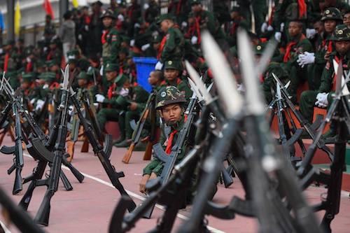 UWSA soldiers rest during a rehearsal in Panghsang ahead of a military parade to celebrate 30 years of a ceasefire signed with the Myanmar military. (Ye Aung Thu / AFP)